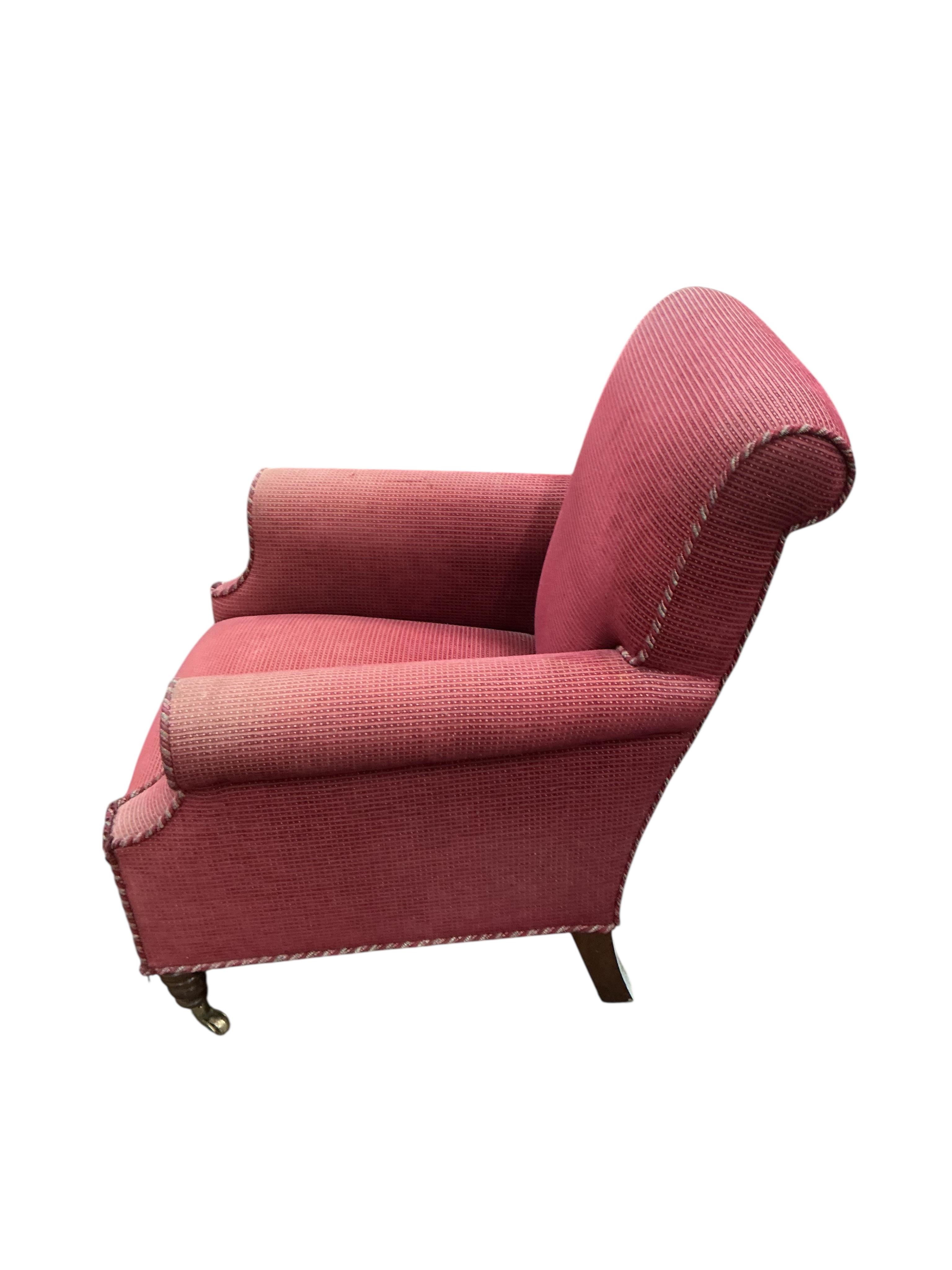 A Victorian style upholstered armchair, width 78cm, depth 76cm, height 90cm
